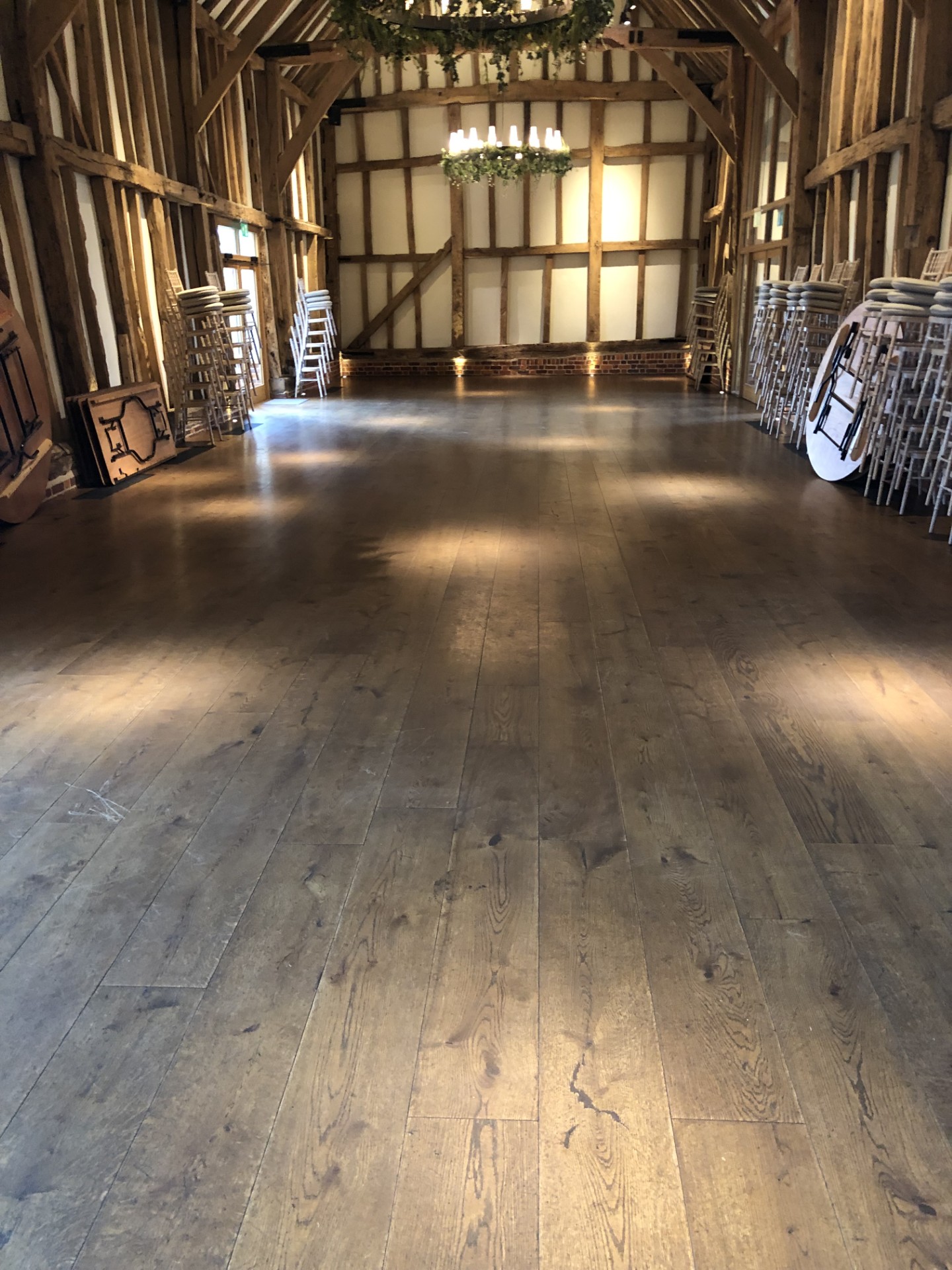 Beautiful Oak flooring restoration in a barn wedding venue in Hertfordshire from Ironwood Flooring Services