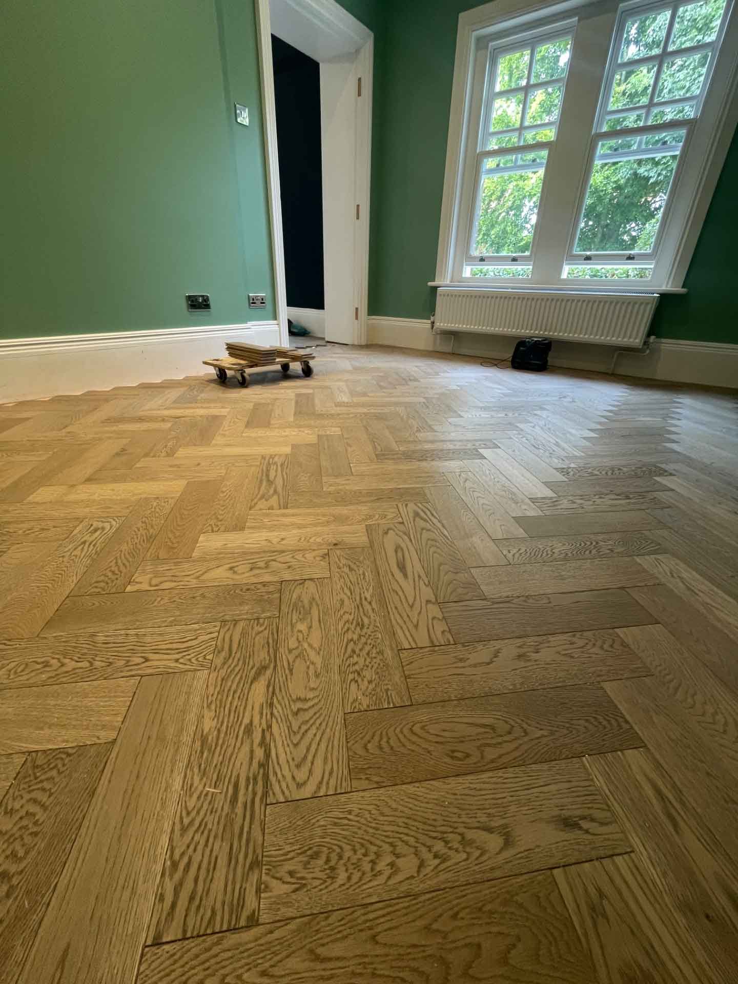 V4 Oak Engineered Herringbone Parquet flooring supplied and fitted by Ironwood Flooring Services in Hertfordshire